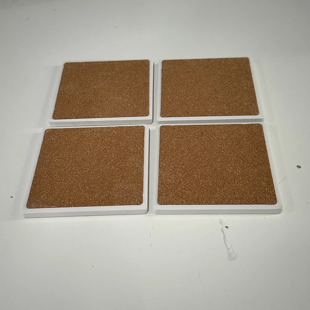 4 set gran Centenario tequila colorful tile coasters. Cork bottom.